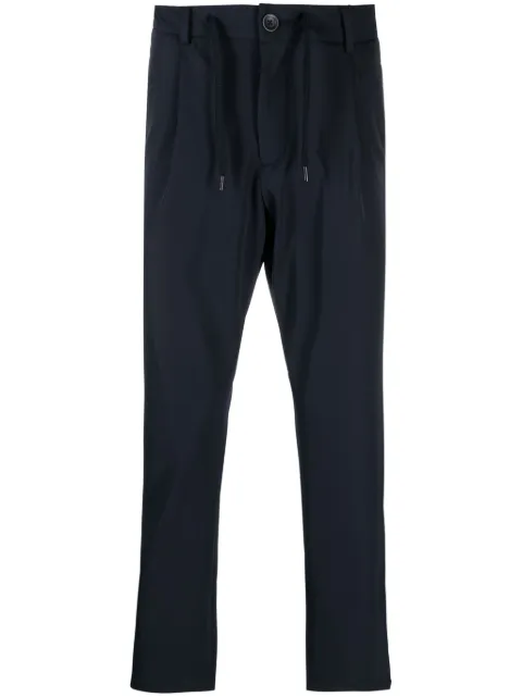 Herno logo-plaque button-fastening tapered trousers 