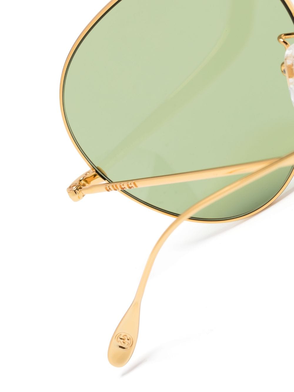 Shop Gucci Logo-lettering Pilot-frame Sunglasses In 金色