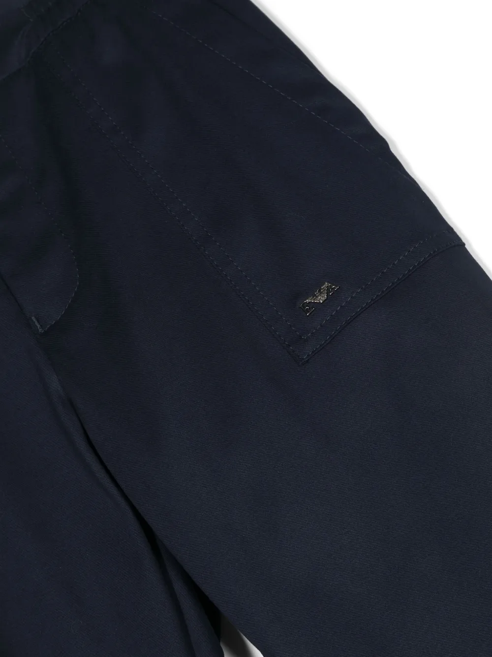 Shop Emporio Armani Logo-plaque Stretch-cotton Tapered Trousers In Blue