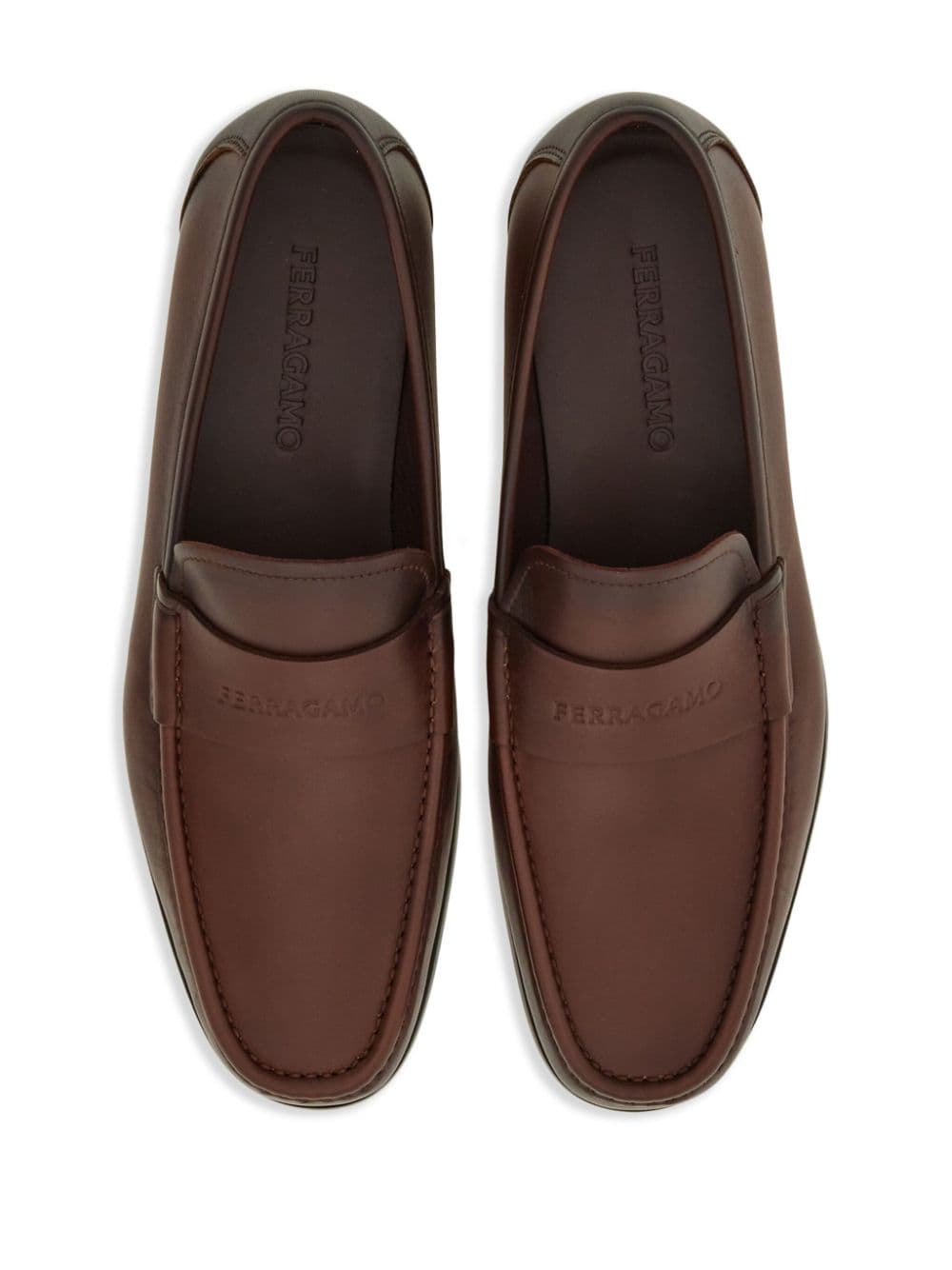 Shop Ferragamo Logo-debossed Leather Loafers In Brown
