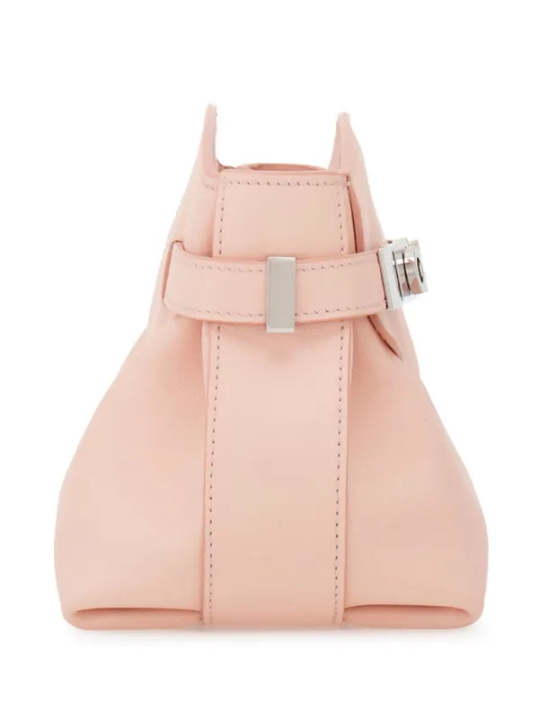 Small clutch purse with strap outlet