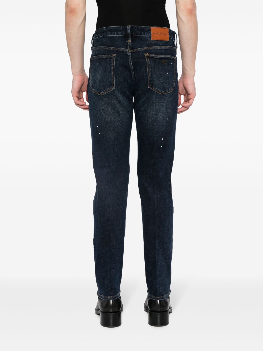 Shop Emporio Armani Paint-splatter Slim-cut Jeans In Blue