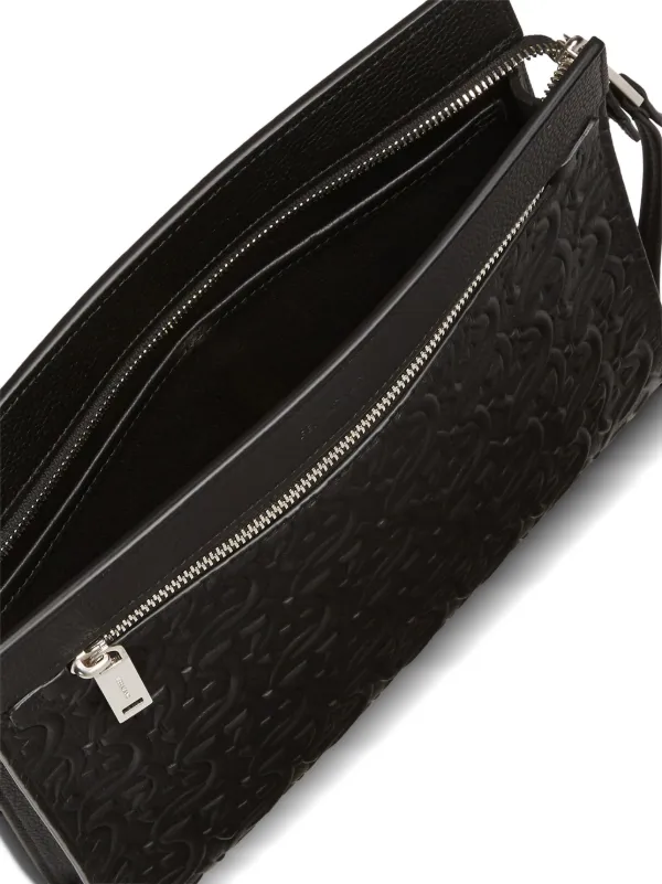 クラッチバッグ FERRAGAMO GANCINI CLUTCH Ferragamo Gancini logo-embossed Clutch Bag | Black | FARFETCH