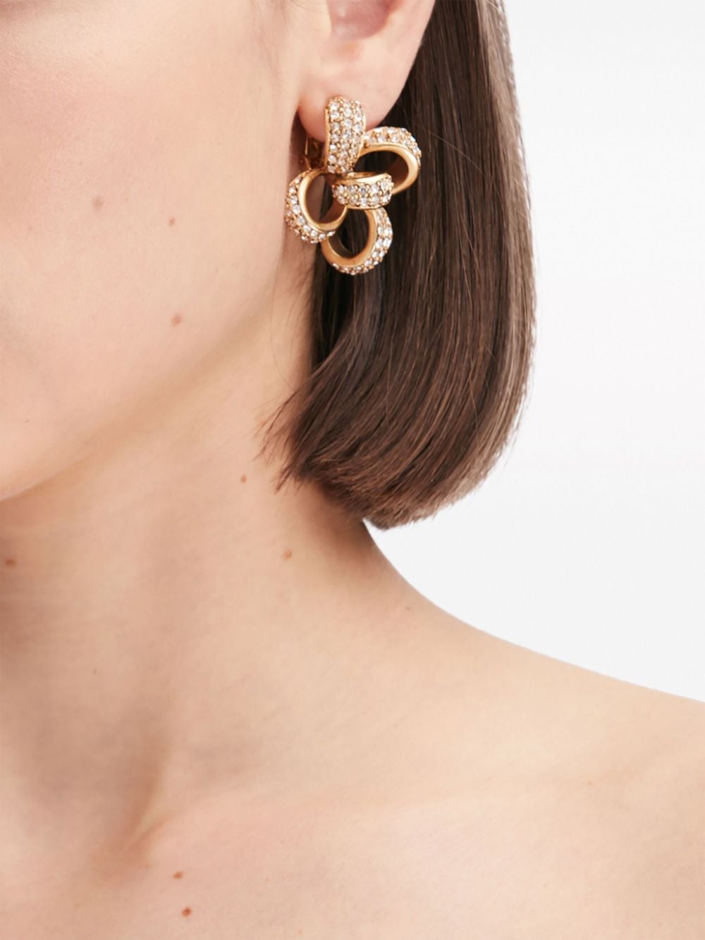 Shop Oscar De La Renta Large Clover Crystal-embellished Clip-on Earrings In Gold