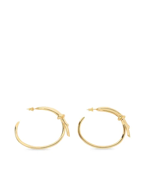 Ferragamo aretes asimétricos en forma de moño