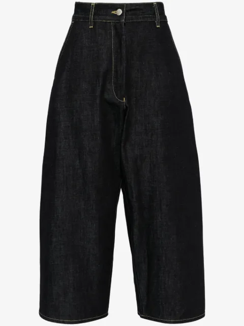 Studio Nicholson jeans capri con diseño ancho