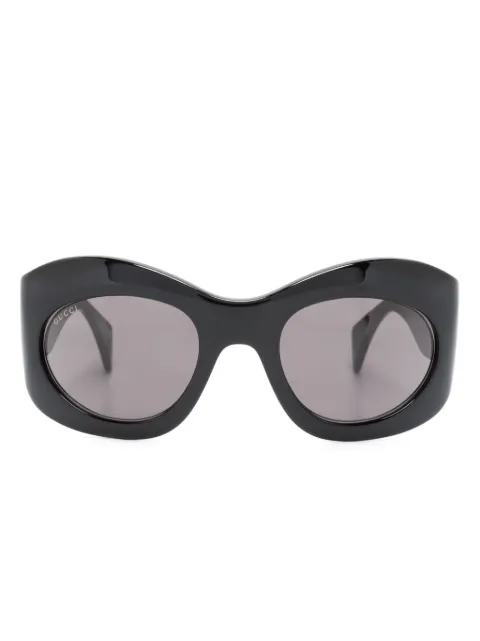 Gucci Eyewear lentes de sol con armazón ovalada y micas oscuras