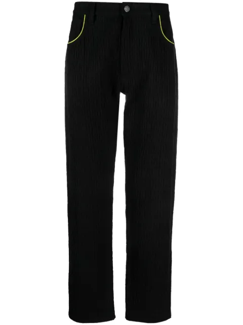 Moschino slim-cut logo-embossed jeans