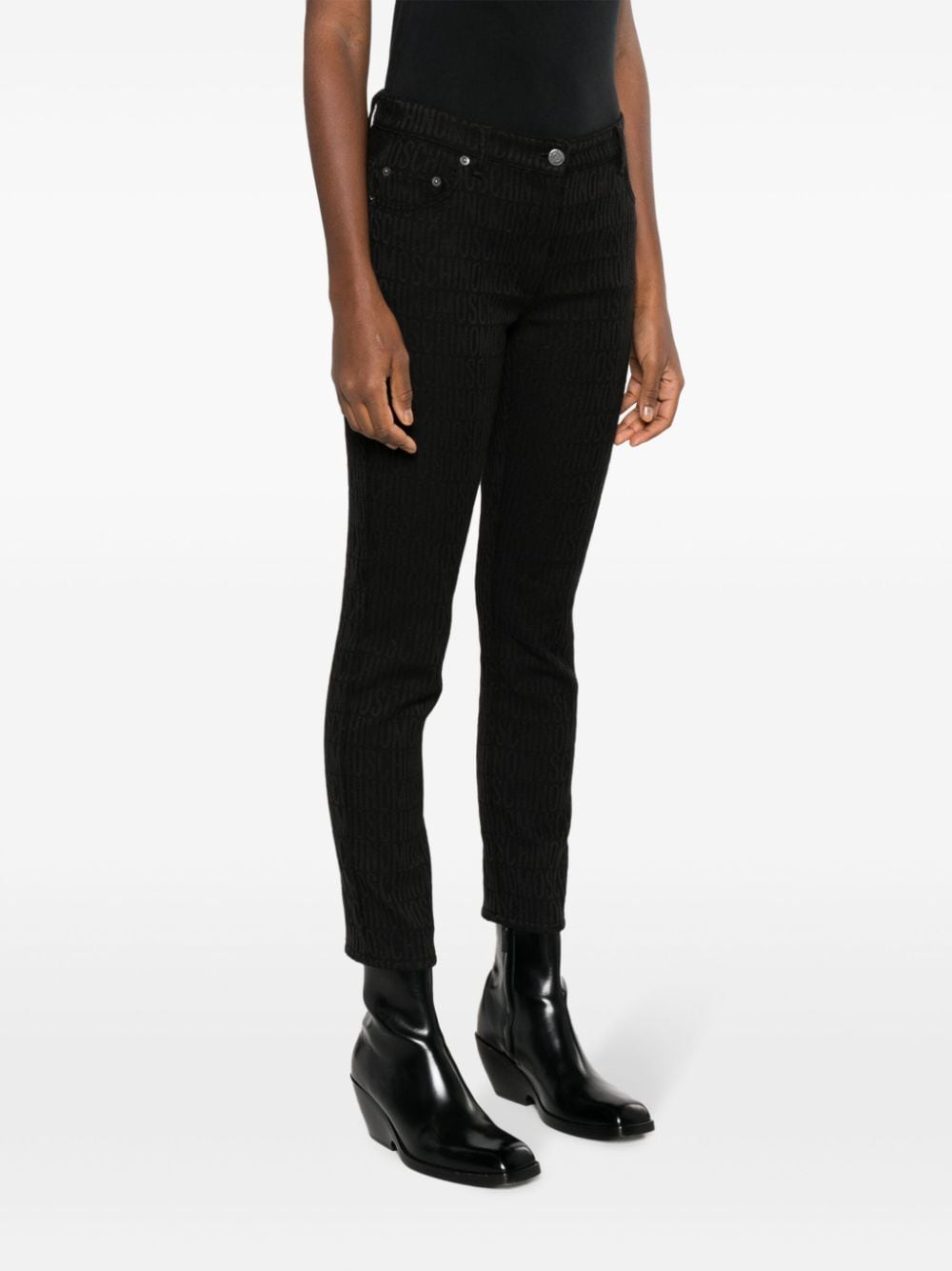 Shop Moschino Logo-jacquard Tapered-leg Jeans In Black
