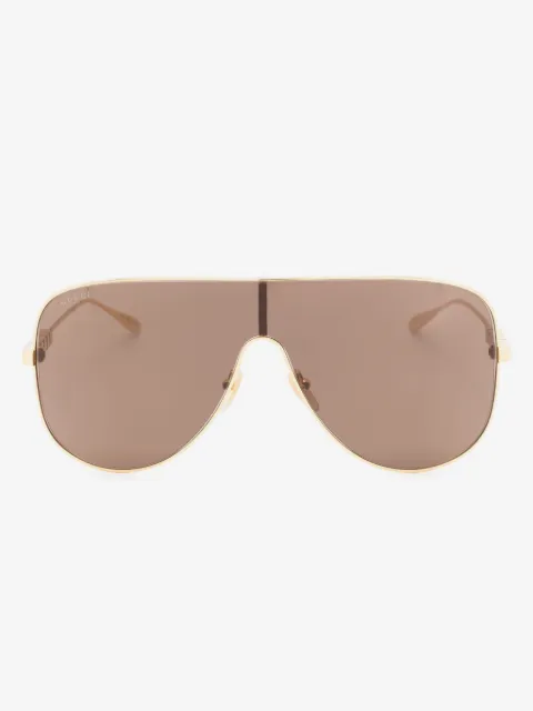 Gucci Eyewear lentes de sol con armazón oversize y detalle de letras