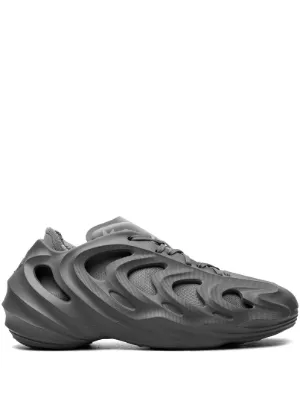 Adidas perforated-design slip-on Sneakers | Black | FARFETCH ZA