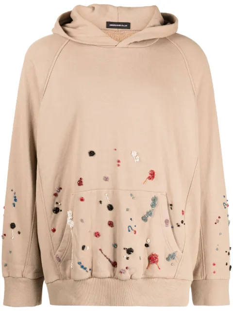 Undercover hoodie con detalle de mostacillas