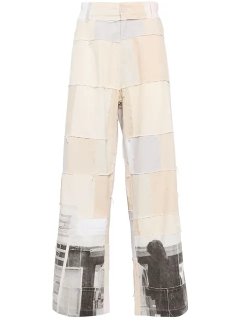 KidSuper graphic-print panelled design trousers