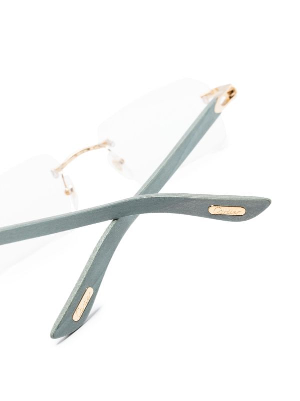 Cartier Eyewear geometric frame Rimless Glasses Farfetch