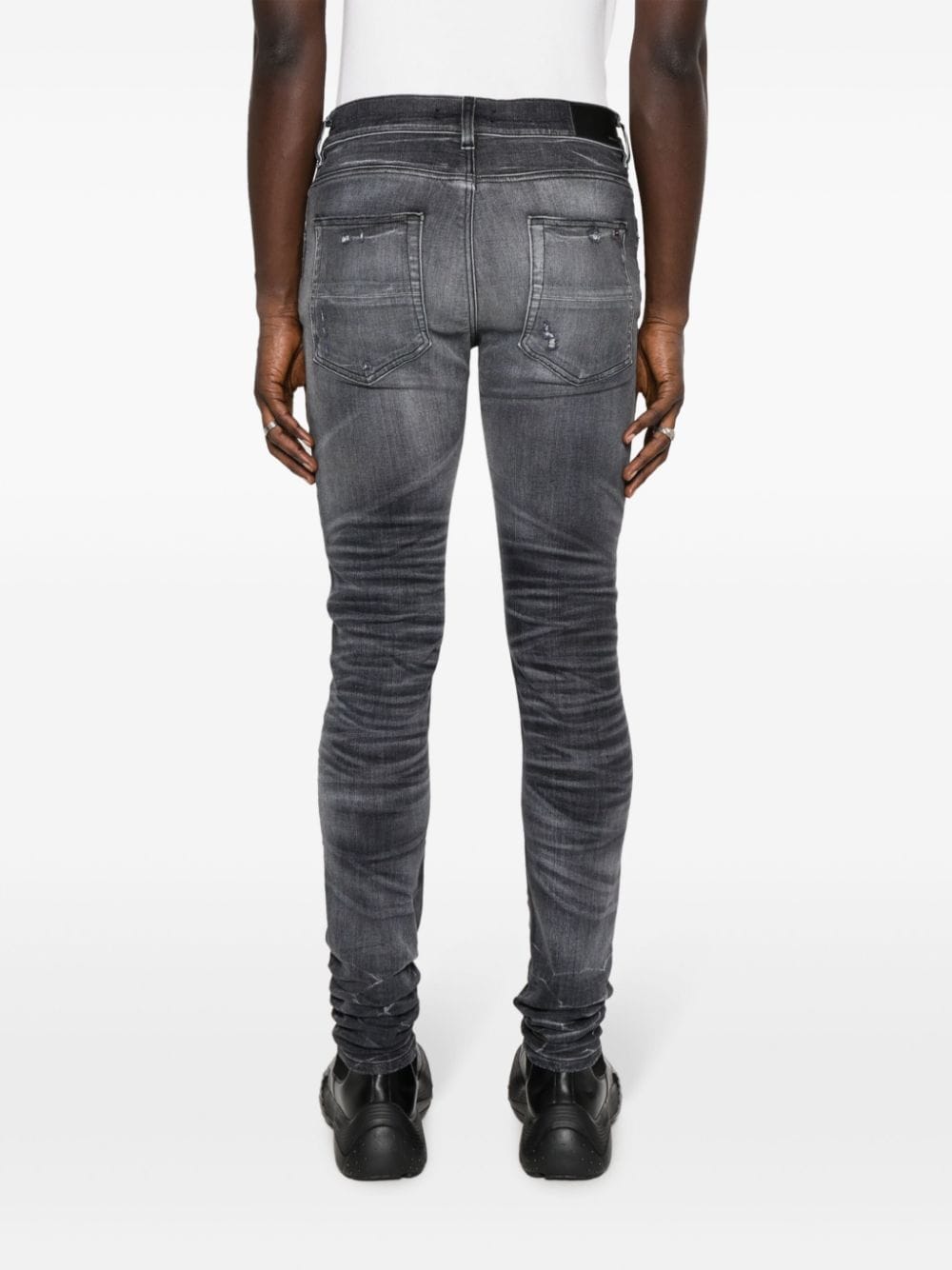 Shop Amiri Stack Skinny Jeans In Grey