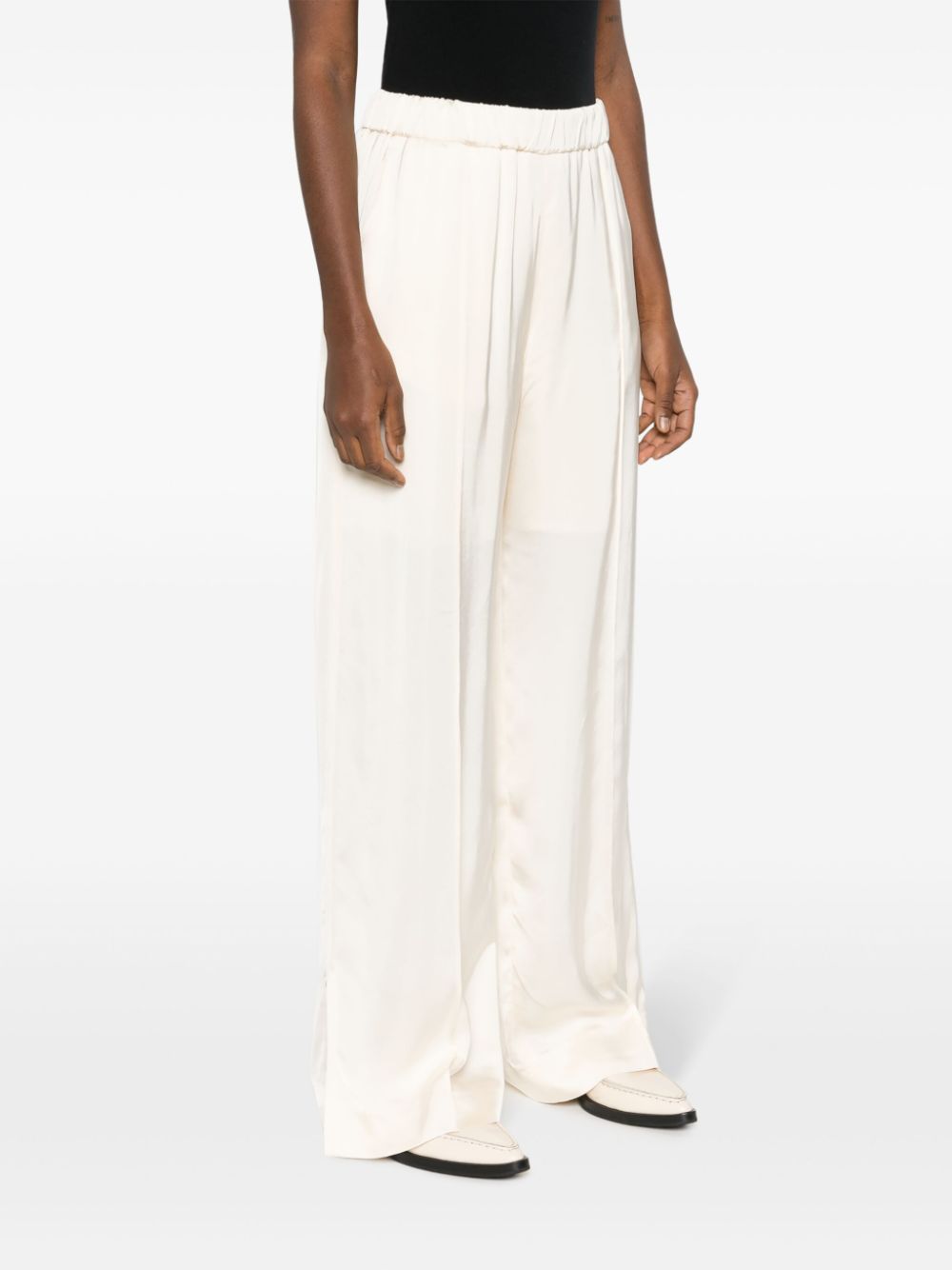 Shop Jil Sander Pressed-crease Elasticated-waist Flared Trousers In Neutrals