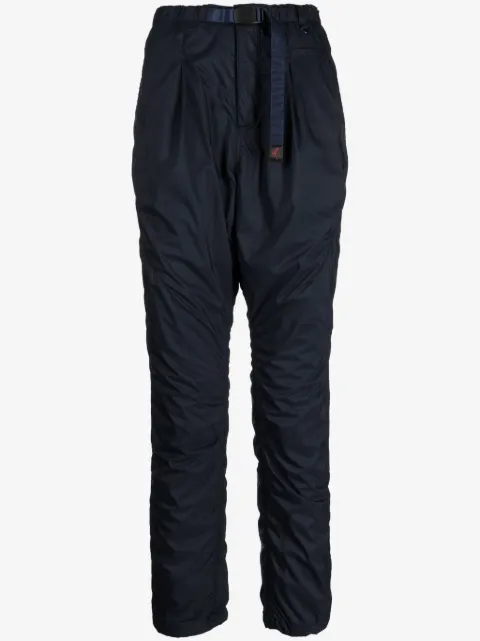 Undercover pantalones tapered con hebilla y etiqueta del logo 