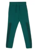 Emporio Armani Kids logo-embossed tapered track pants - Green