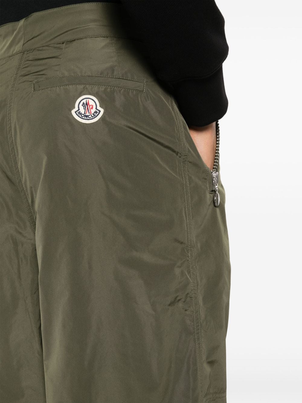 Shop Moncler Logo-patch Lightweight Flared Trousers In Green