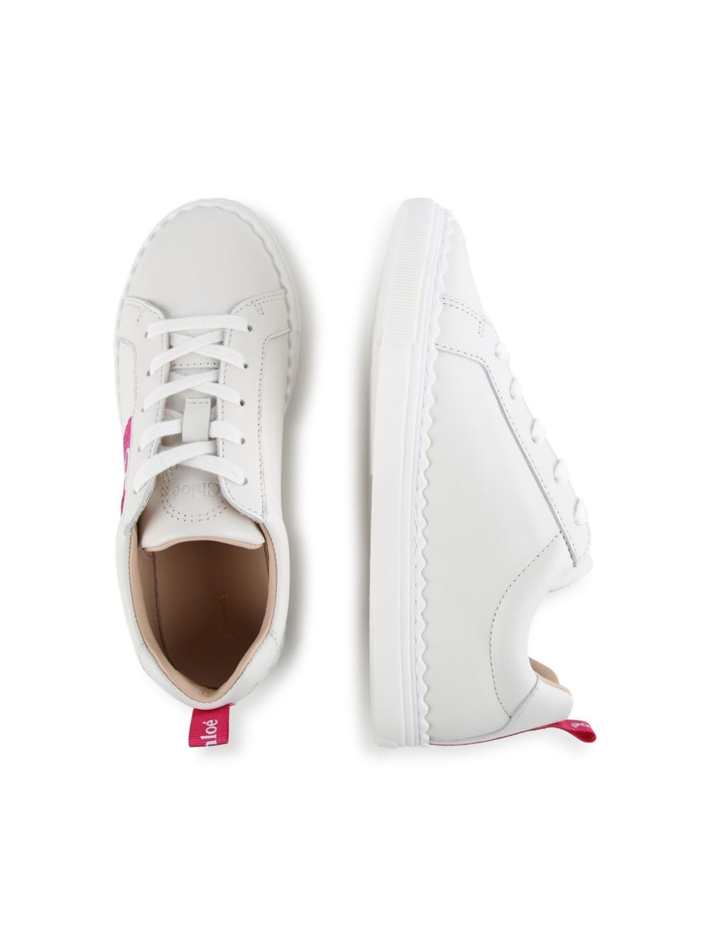 White sneakers with pink on sale soles