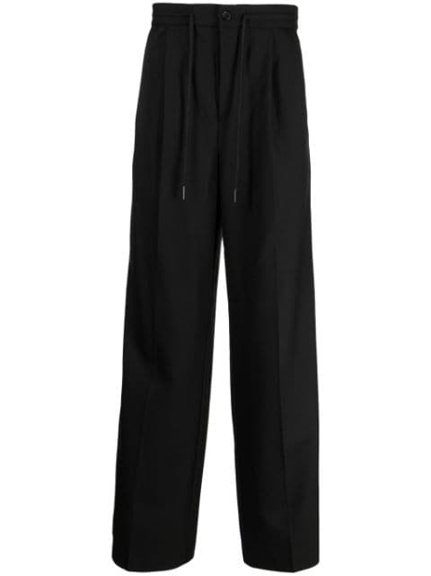 Holzweiler pressed-crease tailored trousers