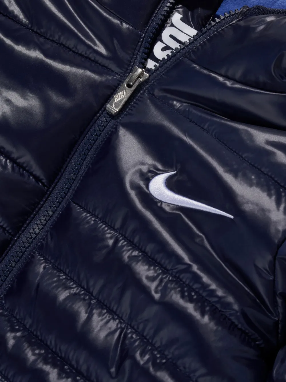 Nike Kids Gewatteerd jack met logoprint Blauw