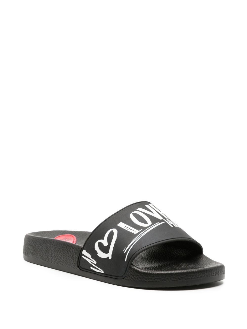 Shop Love Moschino Logo-print Grained-texture Slides In Black