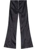 GANNI satin-finish flared trousers - Black