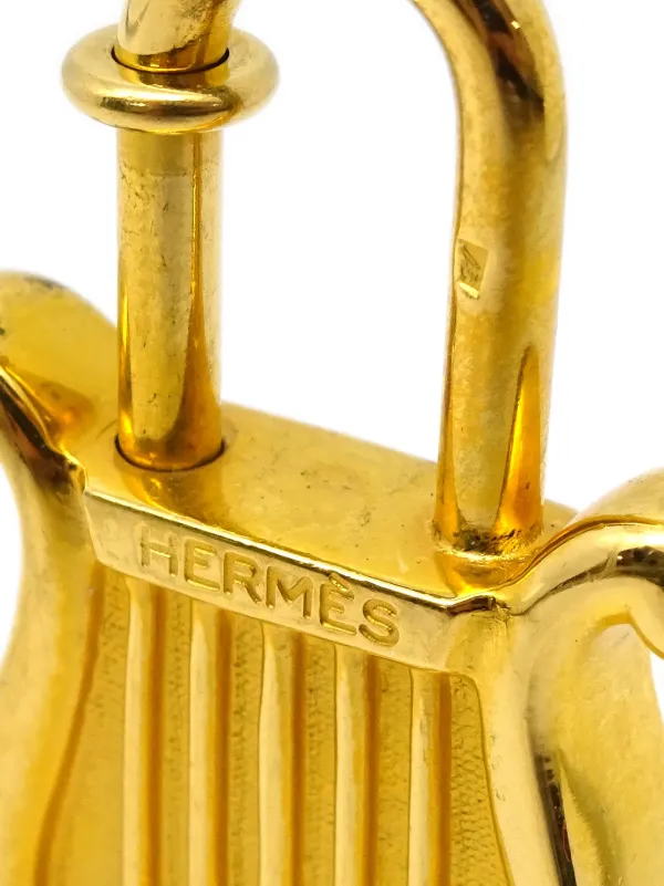 Hermès Pre-Owned 1996 pre-owned Année De La Musique Cadena Padlock Bag  Charm - Farfetch