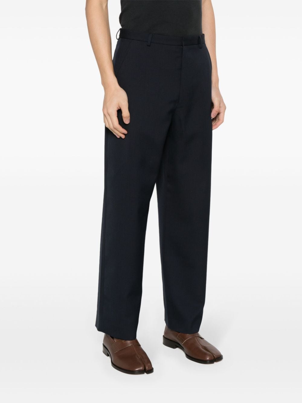 Shop Acne Studios Interwoven Tapered Trousers In Blue