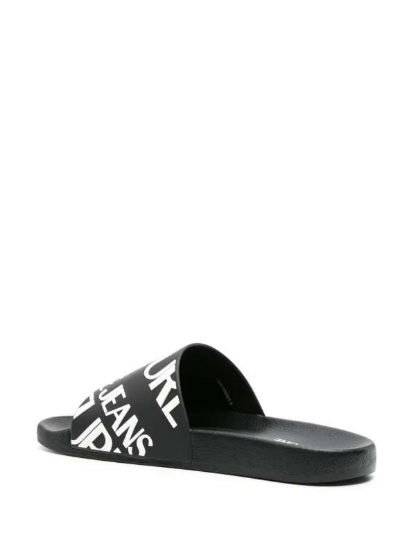 *VERSACE JEANS**COUTURE ロゴ ラバーサンダル フラット Versace Jeans Couture ロゴ サンダル | ブラック | FARFETCH JP