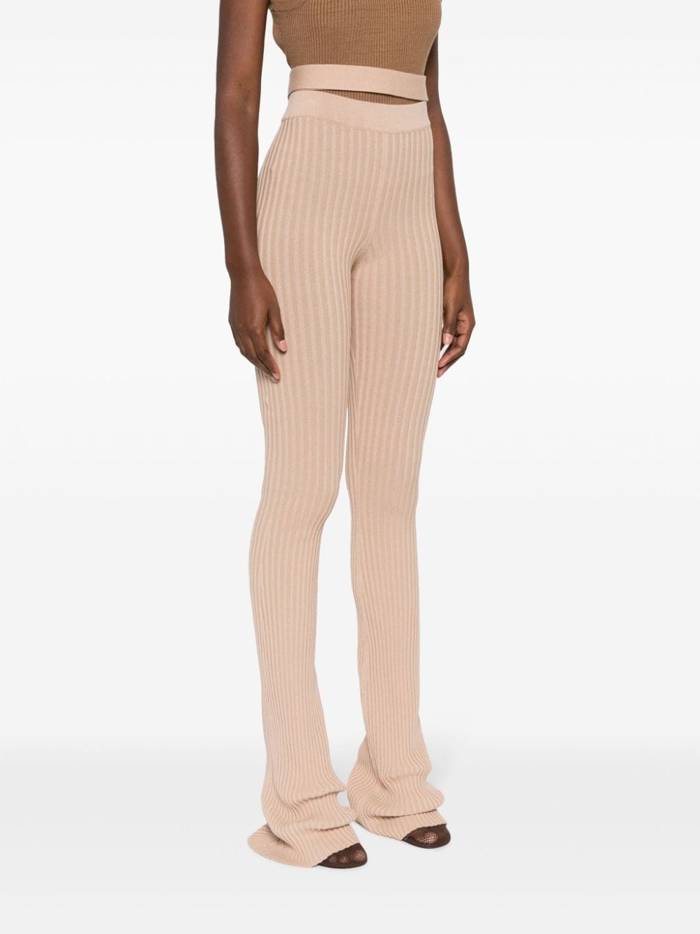 ANDREĀDAMO ribbed-knit high-waist trousers Beige