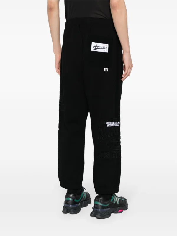 AAPE BY *A BATHING APE® トラックパンツ AAPE BY *A BATHING APE® トラックパンツ | ブラック | FARFETCH JP