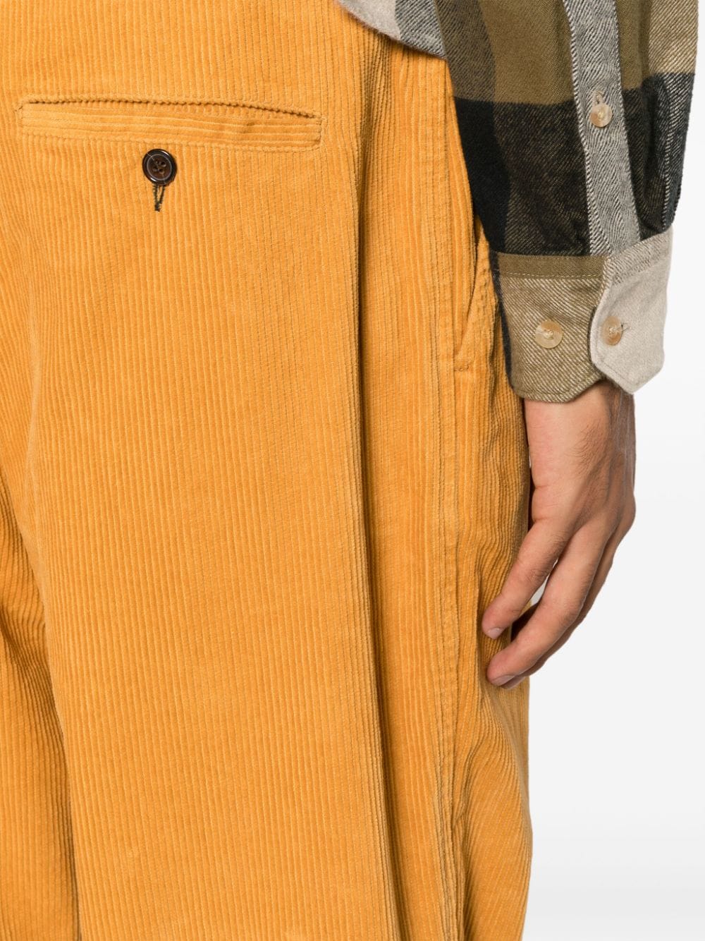 Shop Universal Works Pleat-detail Wide-leg Corduroy Trousers In Yellow