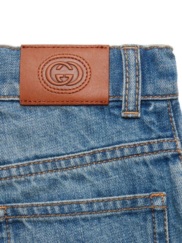 Gucci logo-patch straight-leg Jeans - Farfetch