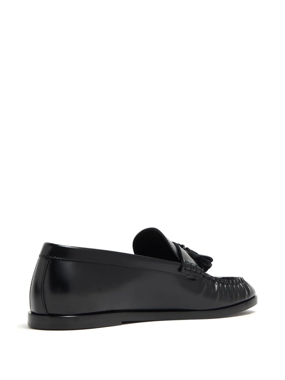 The Row tassel-detailed leather loafers Black