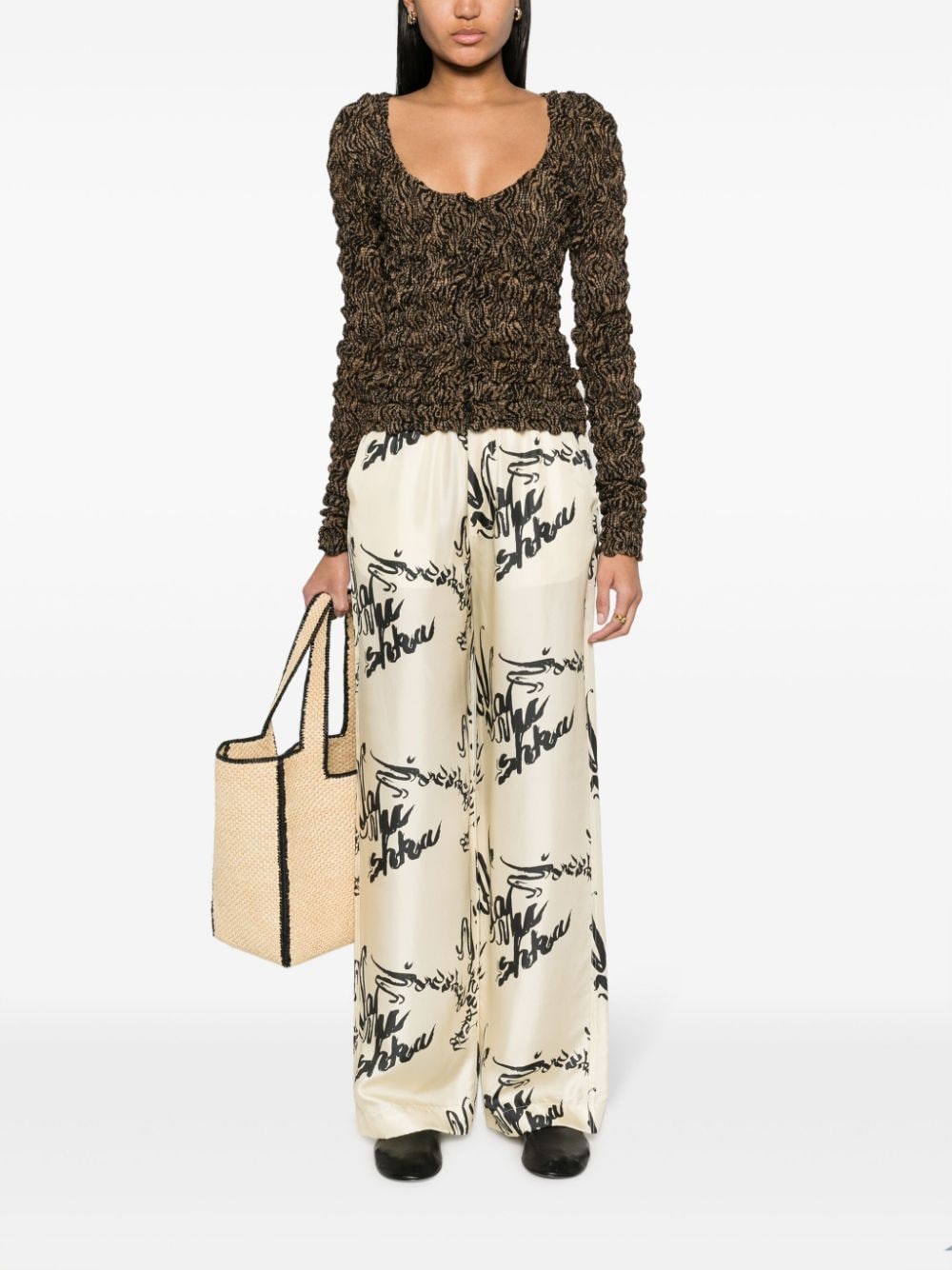 Shop Nanushka Jarine Calligraphy-print Silk Trousers In Neutrals