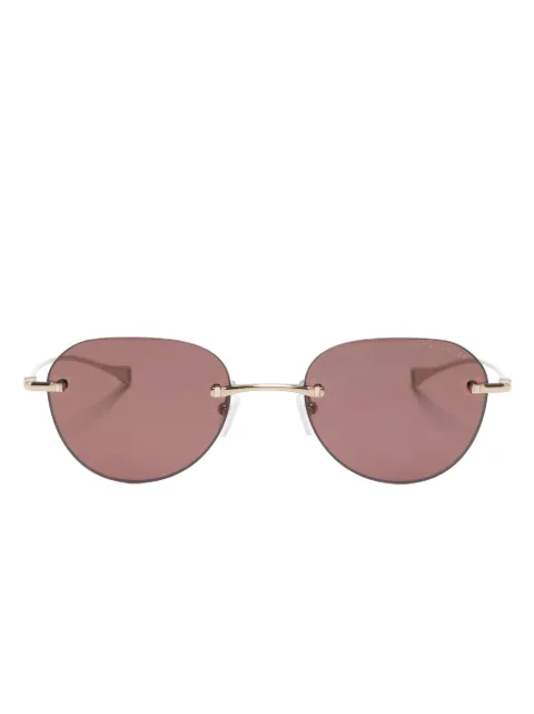 Dita Eyewear lentes de sol con armazón redonda y micas oscuras
