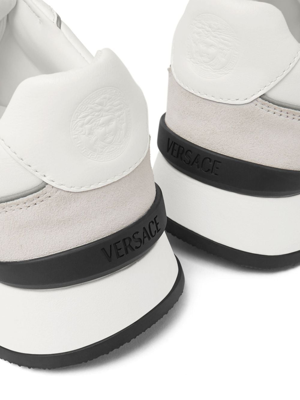 Shop Versace Logo-embroidered Panelled Sneakers In White