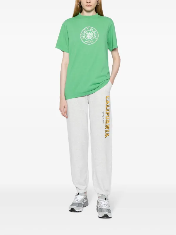 SPORTY & RICH カリフォルニアロゴプリントトラックパンツ Sporty & Rich California トラックパンツ | グレー | FARFETCH JP