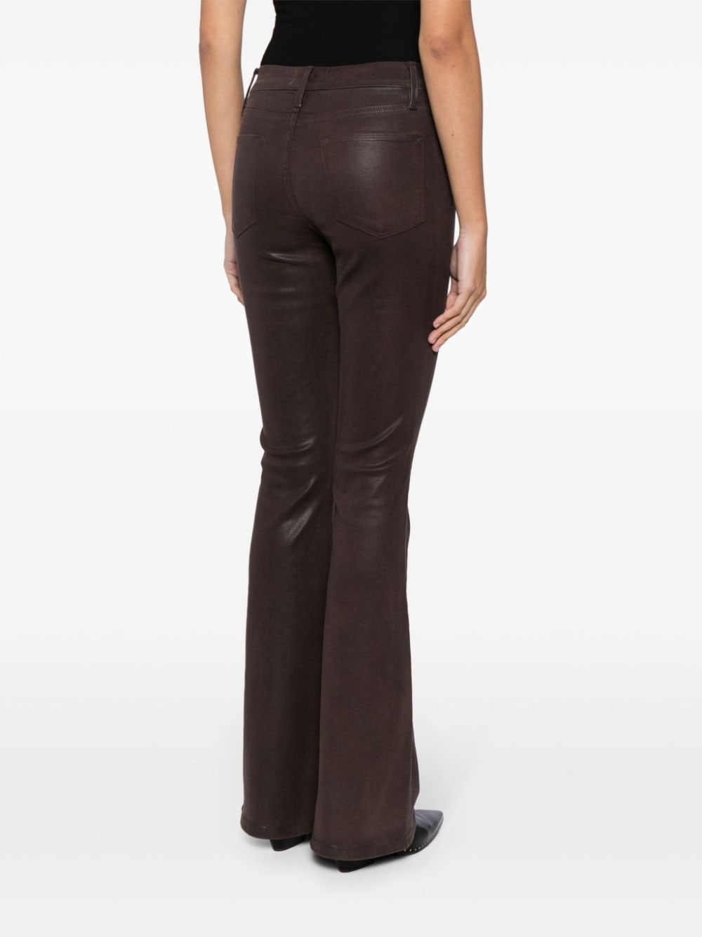 Shop Frame Wax-coated Flared Jeans In Brown