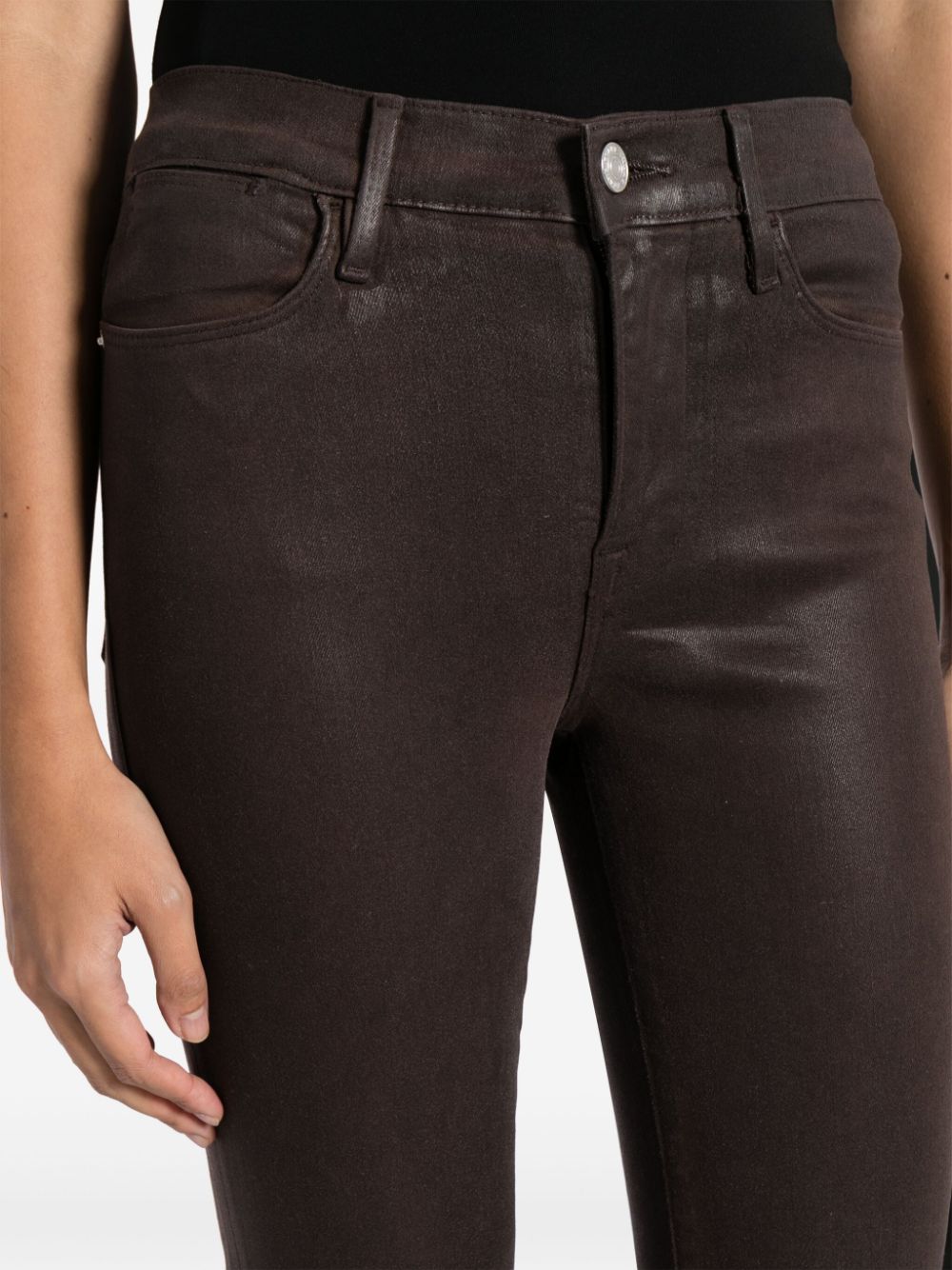 Shop Frame Wax-coated Flared Jeans In Brown