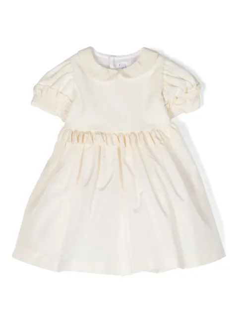 Siola vestido con volantes y detalle de moño 