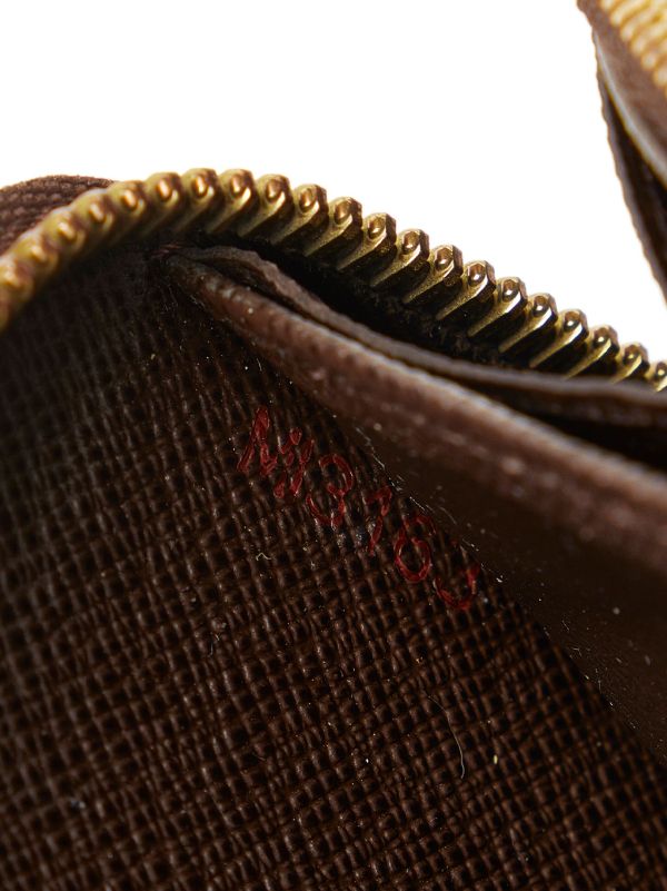 Louis Vuitton pre-owned Zippy Logo Wallet - Farfetch
