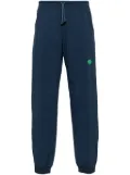District Vision logo-appliqué drawstring-waist track pants - Blue