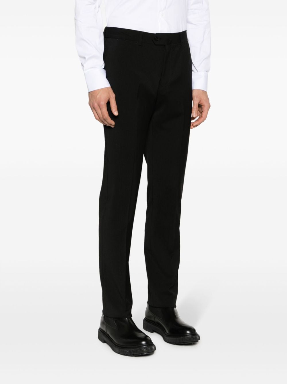 Shop Emporio Armani Virgin-wool Mid-rise Tapered Trousers In Black