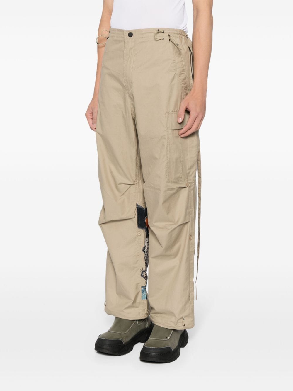 Shop Maharishi Embroidered Straight-leg Trousers In Brown