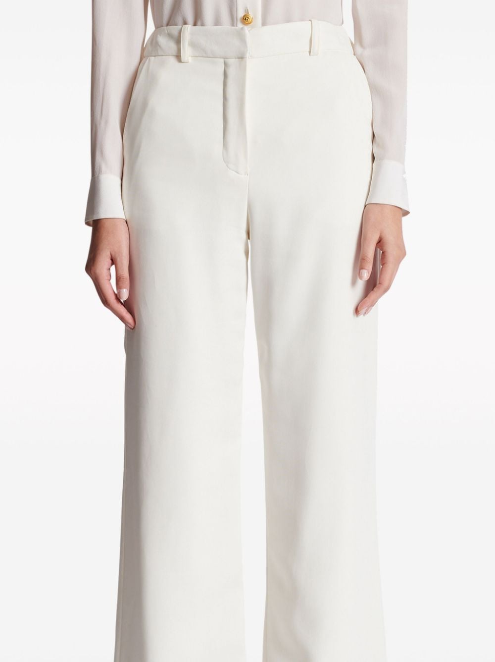 Shop Balmain Crepe Flared Trousers In White