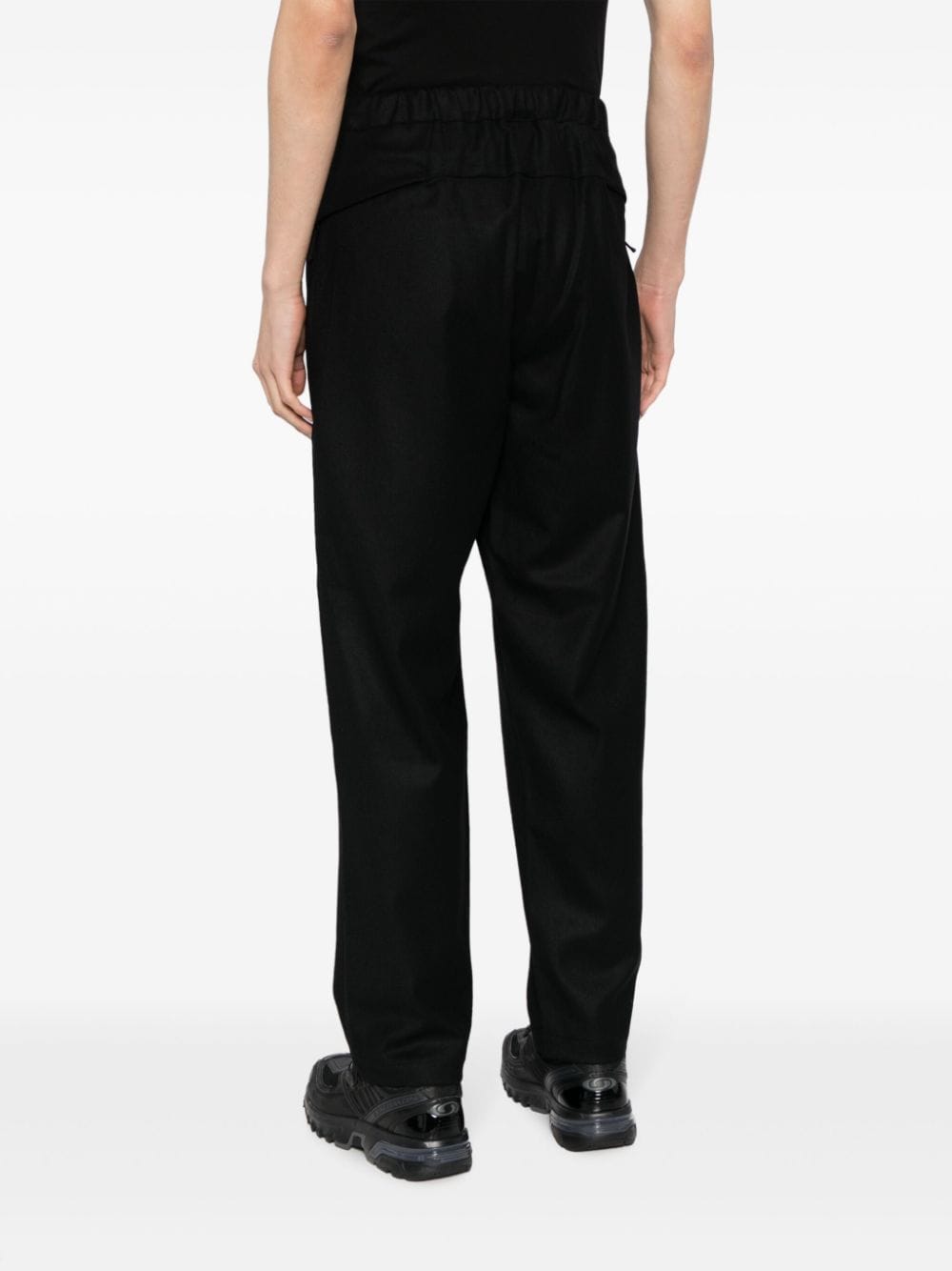 Shop Goldwin All Direction Straight-leg Trousers In Black