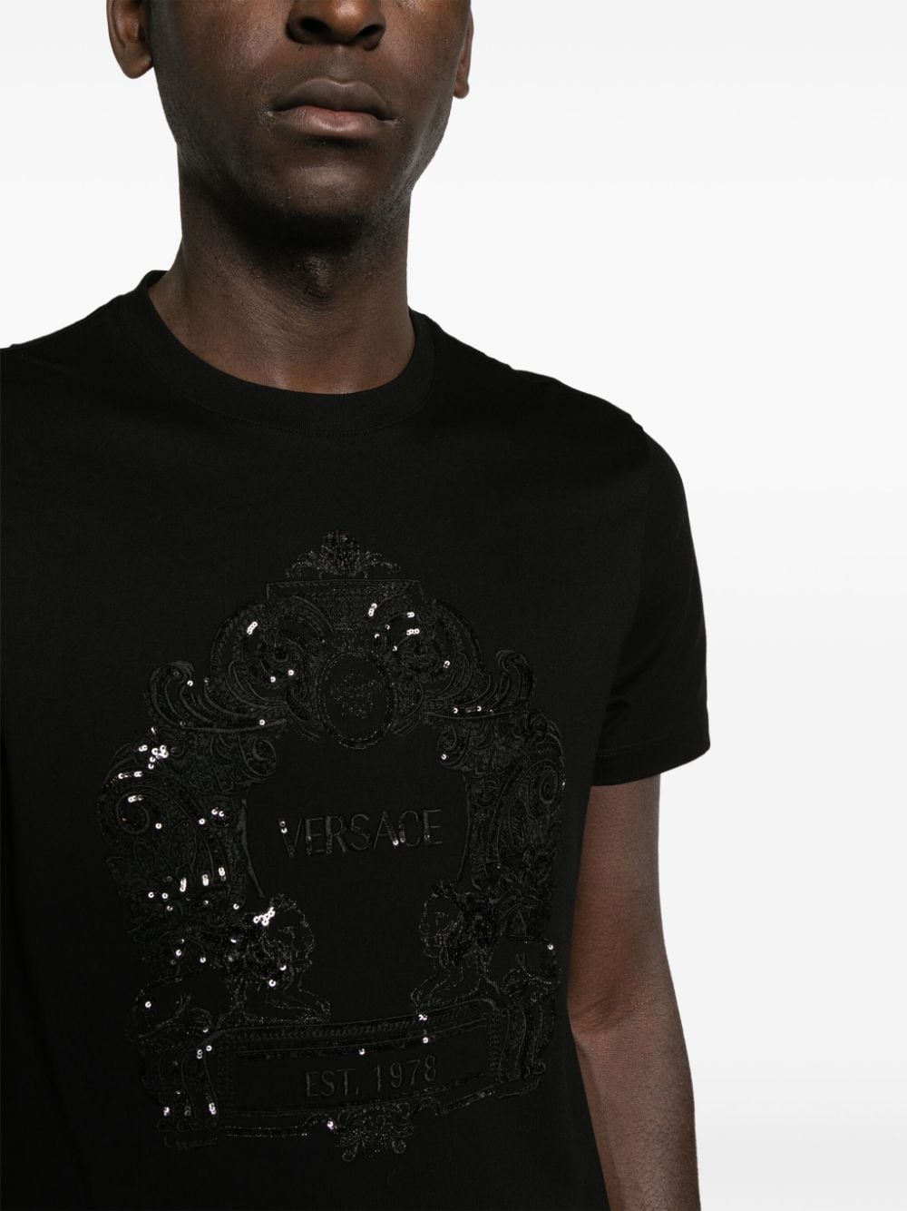 Shop Versace Cartouche-embellished Cotton T-shirt In Black